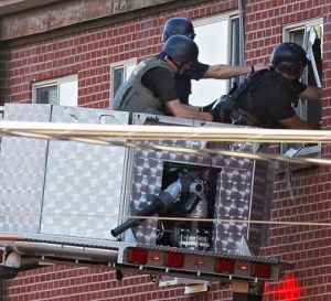 James Eagan Holmes - Aurora, Colorado movie theater - July 20, 2012 - cops breaking into his apartment